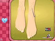 Screenshot of the Foot Fashion Fun game showing decorated toes and a stylish foot ready for a magazine photoshoot