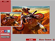 Screenshot of Dirtbike Jigsaw game showing the attractive dirt bike image being pieced together on a puzzle board