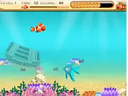 Screenshot of Nemo Finding Foods game, showing the clownfish Nemo swimming and collecting small food items in the ocean