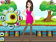 Lovely Spring Dress Up game screenshot – girl model wearing a floral spring dress and hat – free fashion game online