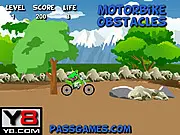 Motorbike Obstacles game screenshot – dirt bike rider balancing on a steep, rocky, uneven terrain course – free online challenge game