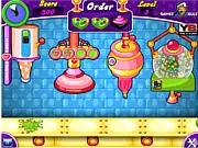 Choco Cake Maker online game showing different types of chocolate cakes and decorating machine buttons