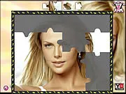 Play Charlize Theron Puzzle free online jigsaw game, drag and rotate pieces of the famous actress's image
