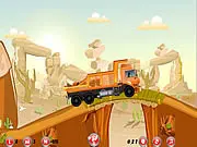 Screenshot of the Trucker game showing a heavy-duty truck loaded with cargo driving over a hilly road | Play free cargo delivery driving game online