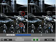 Screenshot from Force of War: Find the Differences game showing two nearly identical military pictures side-by-side with tanks and soldiers.