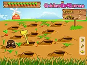 Whack Ground Hogs free online game showing a hammer ready to strike a ground hog that has popped out of a hole on PlayArcadeHub