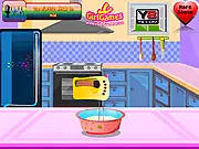 Screenshot of the Love Rainbow Cake game showing a colorful, multi-layered cake being frosted with white cream.