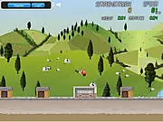 Screenshot of Destructo Truck online game showing a monster truck flying off a ramp towards destructible buildings.