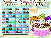 A colorful grid of ice cream scoops being matched in the Ice Cream Shoppe Match free online game, with a large banana split waiting below.