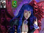 Screenshot of Cosplay Photos Memory 2 online game showing a grid of cards with several uncovered photos of women in creative costumes.