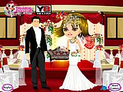 The celebrity bride Georgia modeling a glamorous white wedding dress and veil in the Celebrity Wedding Dressup free online game.