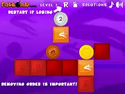 Three Olympic Medals game screenshot, showing medals above colored blocks and podiums, free online puzzle game