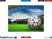 Soccer Stadium Jigsaw online puzzle game screenshot, showing puzzle pieces of a large, empty soccer stadium