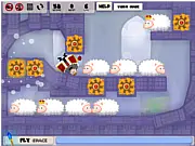 King Rolla Puzzle free online game screenshot showing a cartoon king rolling with his belly to clear sheep from a castle.