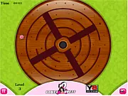 Play Flower Escape free maze game online. A tiny pink flower is at the start of a winding, green maze with obstacles.