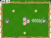 Pigs Go Home online game screenshot showing cows being flung into pigs on a wooden platform.