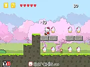 Hello Kitty jumping to collect a cupcake while avoiding the enemy character Badtz-Maru in the colorful platformer game.