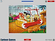 Screenshot of The Flintstones Jigsaw game showing a partially completed puzzle featuring Fred Flintstone, Barney Rubble, and a dinosaur
