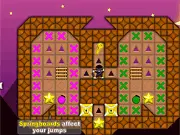 Ninja Painter Two game screenshot showing a ninja character on a maze-like level, holding a paintbrush and standing near buckets of different colored paint.