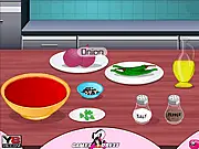 A screenshot from the Mutton Blood Fry Recipe cooking game, showing Chef Anita next to a frying pan with the final dark, crumbly dish and various spices on a cutting board.