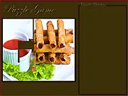Free online Tasty Puzzle game, featuring a colorful jigsaw puzzle with various cooking ingredients and food items
