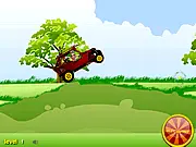 Bakugan Buggy free online racing game screenshot showing a Bakugan character driving an off-road buggy on a hilly course