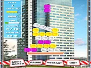 Building Mastery 2 game screen showing a precarious tower built from various colored and shaped blocks