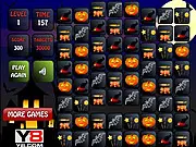 Play Halloween Match 3 free online puzzle game, featuring spooky items like pumpkins and skulls being matched in a group of three.