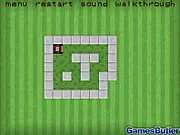 Free online logic puzzle game Just a Trim Please, showing a lawnmower on a garden grid attempting to perfectly mow the lawn without retracing.