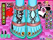 Screenshot from Monster High Foot Makeover free online game showing a character's foot being decorated with spooky polish and accessories.