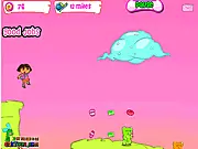 Dora In Gummyland free online game screenshot showing Dora running and jumping over a gummy bear enemy in a candy land environment