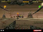 Pumpkin Head Rider 2 free online bike racing game, the rider performing a jump over an obstacle on a spooky, Halloween-themed track.
