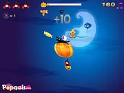 Halloween Fly High free online game featuring a hot air balloon collecting candy and dodging monsters