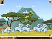 Free online game Haste Makes Waste, showing a turtle being launched from a cannon across a forest landscape