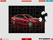 Pontiac G8 Puzzle free online game showing a disassembled image of the popular silver Pontiac G8 car