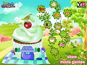 Screenshot of the Cupcake House Decorating game showing a beautifully customized cottage made of a giant cupcake with candy and frosting decorations