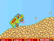 Scooby Doo Mystery Machine Ride free online game, the Mystery Machine van balancing on a hilly road and collecting ghosts