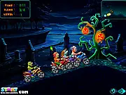 Zombie Racer game screenshot showing a cartoon zombie riding a dirt bike aggressively against other zombie racers on an off-road track