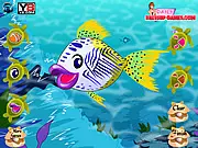 Johnny The Fish Dressup free online game screenshot with a cute fish wearing accessories