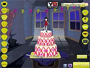 Play Monster High Cake Decor free online game, featuring a spooky-chic cake decorated with the Skullette logo and purple frosting
