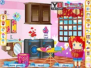 Screenshot of Laundry Room Decoration online game showing a custom-designed room with a stylish washer, dryer, and modern storage cabinets