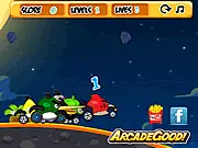 Gameplay screenshot of Angry Birds Go! showing Red and King Pig racing karts downhill on a vibrant 3D track on Piggy Island, free online kart racing game