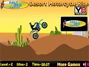 Desert Motorcycle Rides game screenshot showing a dirt bike driving over a sand dune with collectible coins