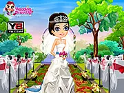 Rebecca's Dream Outdoor Wedding Dress Up Game screenshot, showing a bride modeling a wedding gown in a garden setting