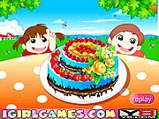 Beautiful Chocolate Cake game screen showing a decorated chocolate layer cake with frosting, sprinkles, and fruit toppings
