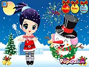 Merry Christmas-Noel and Snowman free online dress-up game featuring a girl in a holiday outfit standing next to a festive snowman.