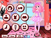 Sweet and Punk Dress Up game screenshot showing a girl with pink hair wearing a trendy outfit that combines punk elements like studs and chains with cute, colorful clothing, free online fashion game