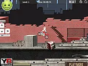 Stunt Moto Mouse 2 game screen showing a small mouse riding a dirt bike over construction yard obstacles, free extreme motocross game