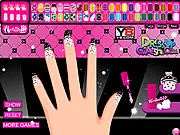 Draculaura Manicure free online game showing Monster High character with pink and black styled fingernails and accessories