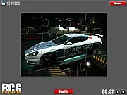 Aston Martin Jigsaw online game screenshot. Luxury sports car puzzle pieces on PlayArcadeHub. Free car puzzle game.
